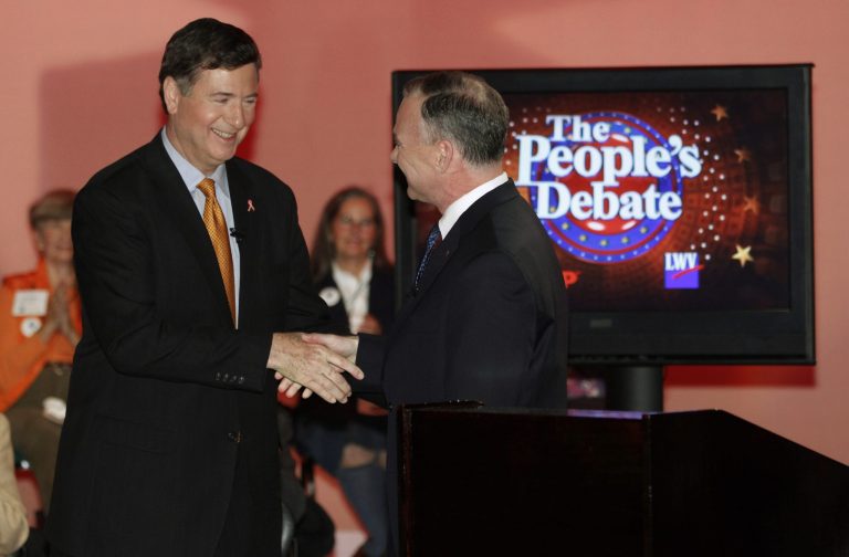 George Allen, left, shakes the hand of Tim Kaine, after their debate in Richmond. (AP Photo)