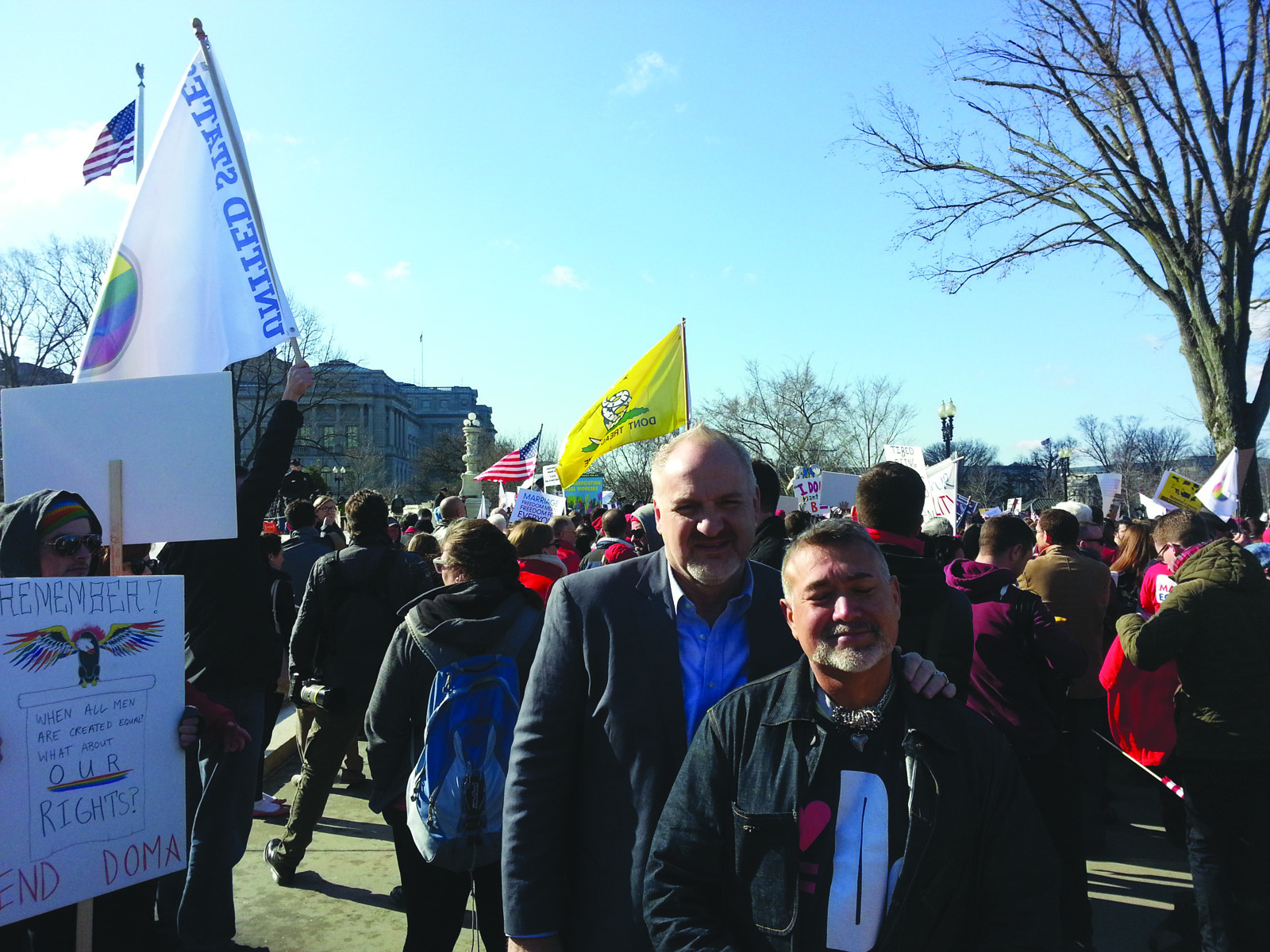 Chef Art Smith and husband Jesus Salgueiro attend Supreme Court rally