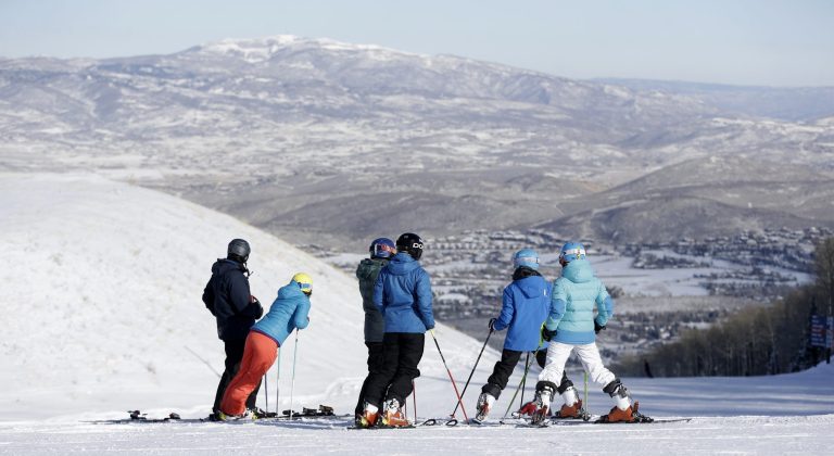 FILE - This Nov. 23, 2013, file photo, shows skiers at Park City Mountain Resort, in Park City, Utah. A long-running court battle between two ski industry titans is putting the upcoming season in jeopardy at one of Utah's largest resorts. A Utah judge is expected to decide Friday how much Park City Mountain Resort must pay to cover back rent and court costs so it can stay open through April 2015. If the price tag is too high, the lifts could stand idle when the season opens in less than three months. (AP Photo/Rick Bowmer, File)
