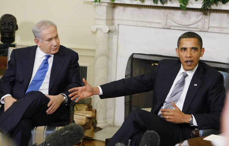 The intense sniping between the outgoing and incoming administrations over the stalled Middle East peace process is the latest sign of a growing partisan divide over Israel. (AP Photo/Charles Dharapak)