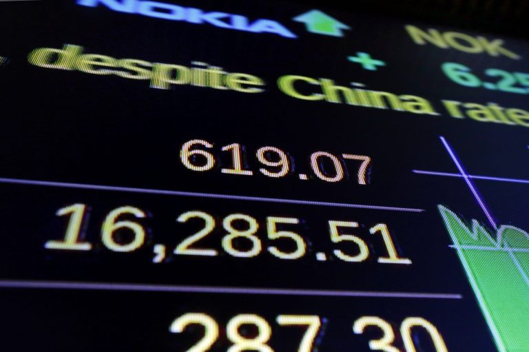 A screen above the trading floor of the New York Stock Exchange, shows the closing number for the Dow Jones industrial average, Wednesday, Aug. 26, 2015. U.S. stocks closed sharply higher, giving the stock market its best day in close to four years. (AP Photo/Richard Drew)