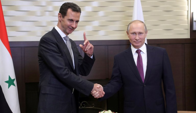 Until the axis is ready to transfer real power to those Syrians it has brutally oppressed, the U.S. should not dance to Putin's diplomatic waltz. (Mikhail Klimentyev, Kremlin Pool Photo via AP)