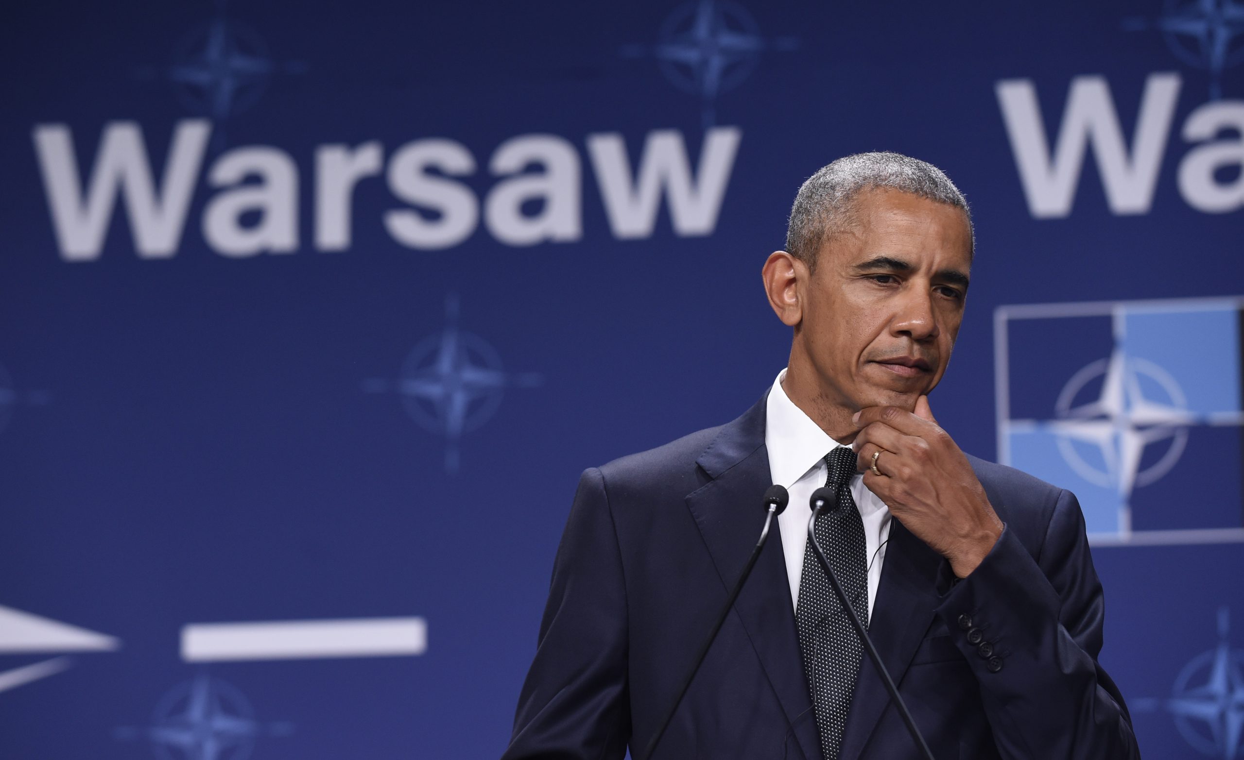 Obama returns from Europe to a nation on edge