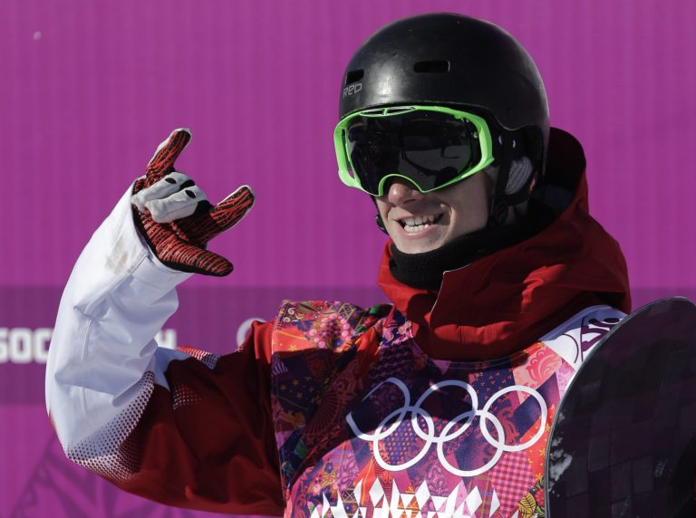 Canada's Maxence Parrot reacts after a run during the men's snowboard slopestyle qualifying at the Rosa Khutor Extreme Park ahead of the 2014 Winter Olympics, Thursday, Feb. 6, 2014, in Krasnaya Polyana, Russia.  (AP Photo/Andy Wong)