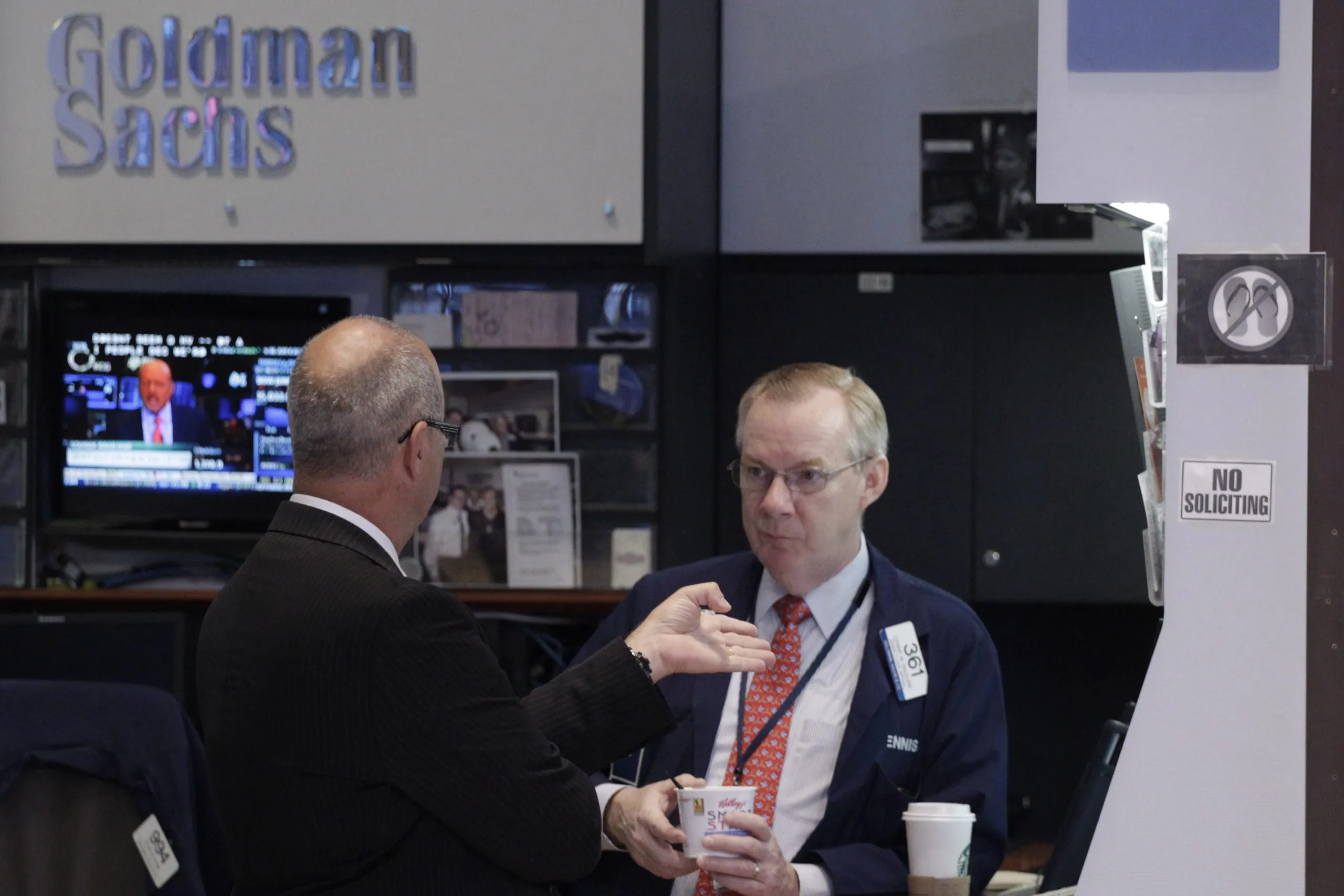 Goldman Sachs posts higher profit and revenue