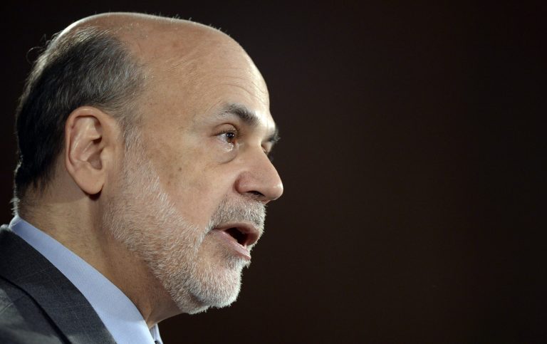   FILE - In this Sept. 18, 2013 file photo, Federal Reserve Chairman Ben Bernanke speaks during a news conference at the Federal Reserve in Washington. The Federal Reserveâs decision to postpone any pullback in its economic stimulus immediately ignited a debate: Was the Fed right or wrong to delay the inevitable? (AP Photo/Susan Walsh)  