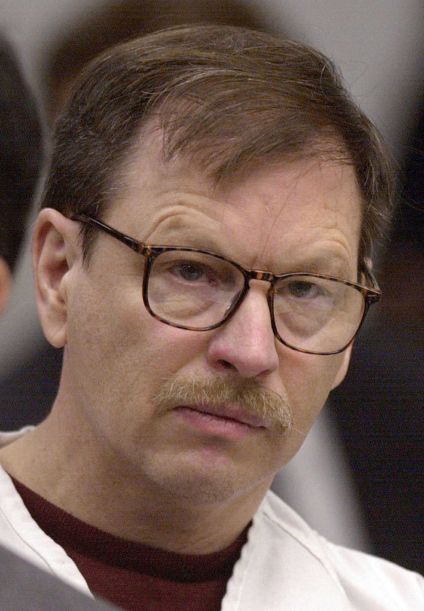 Gary Ridgway, the so-called "Green River Killer," looks around the courtroom during his sentencing in this Dec. 18, 2003, file photo, in Seattle.