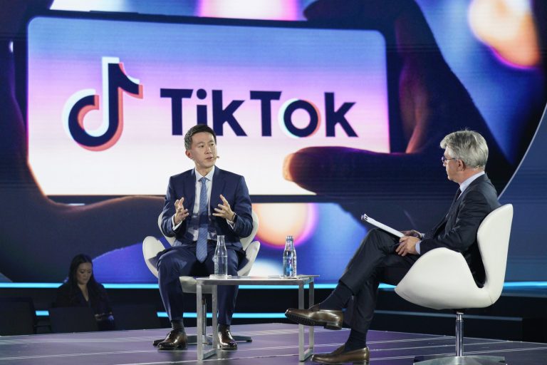 Shou Zi Chew, chief executive officer of TikTok Inc., speaks with Reto Gregori, deputy editor-in-chief, Bloomberg Editorial and Research, during the Bloomberg New Economy Forum in Singapore, on Wednesday, Nov. 16, 2022. 