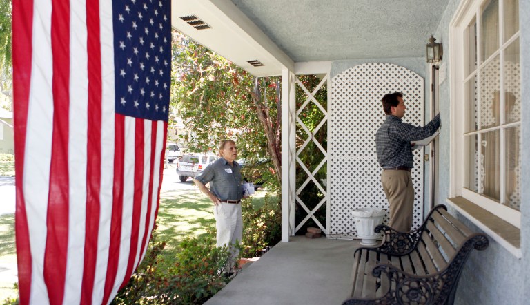 In this Saturday, May 29, 2010, Nathan Mintz, a candidate for the 53rd Californaia Assembly district, running unopposed on the Republican ticket but more a proponent of the Tea Party movement, that claims both major parties have lost touch with voters' wishes, walks a neighborhood with campaign volunteer Jake Chapsky in Torrance, Calif.