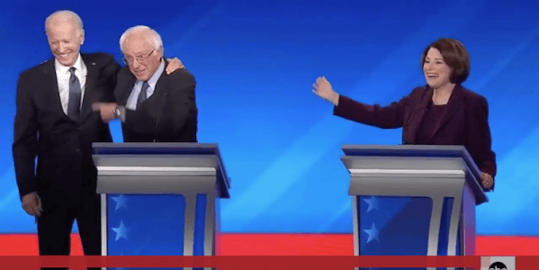 Biden hugs Bernie Sanders at New Hampshire debate