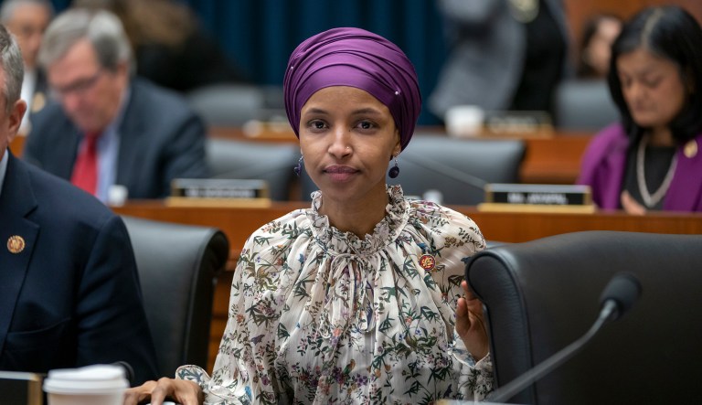 Rep. Ilhan Omar, D-Minn., sits with fellow Democrats on the House Education and Labor Committee during a bill markup, on Capitol Hill in Washington, Wednesday, March 6, 2019. Omar stirred controversy last week saying that Israel's supporters are pushing U.S. lawmakers to take a pledge of "allegiance to a foreign country." Omar is not apologizing for that remark, and progressives are supporting her.