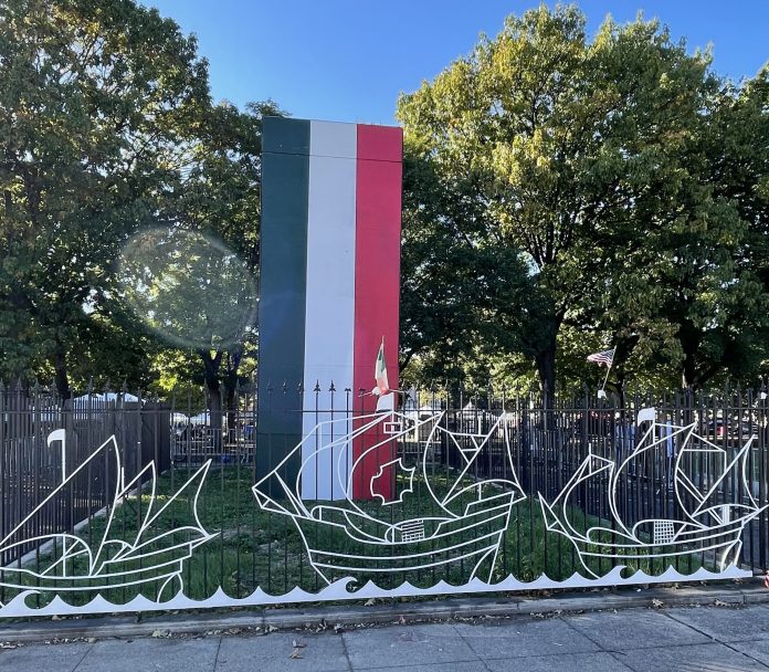 Philadelphia's Columbus statue boxed in plywood and painted the colors of the Italian flag.