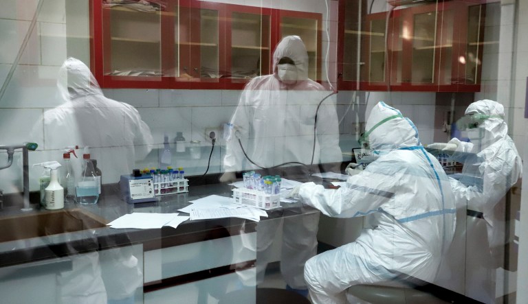 Workers disinfect the shrine of the Shiite Saint Imam Abdulazim to help prevent the spread of the new coronavirus in Shahr-e-Ray, south of Tehran, Iran, Saturday, March, 7, 2020.