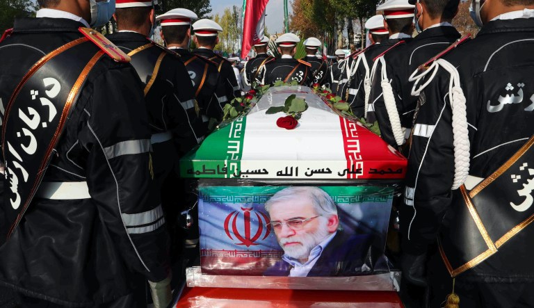 In this photo released by the official website of the Iranian Defense Ministry, military personnel stand near the flag draped coffin of Mohsen Fakhrizadeh, a scientist who was killed on Friday, in a funeral ceremony in Tehran, Iran, Monday, Nov. 30, 2020. Iran held the funeral service for Fakhrizadeh, who founded its military nuclear program two decades ago, with the Islamic Republic's defense minister vowing to continue the man's work "with more speed and more power."