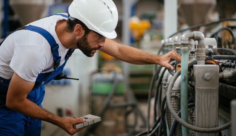 Engineer with walkie-talkie.