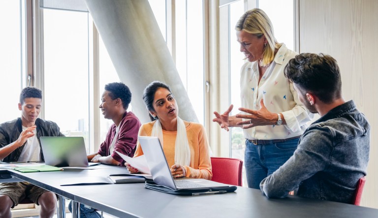 A group consisting of people from different ethnic backgrounds is shown.