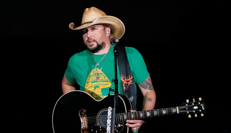 Jason Aldean addresses the crowd about the shooting in Las Vegas during his concert in Tulsa, Okla., Thursday, Oct. 12, 2017. Country star Aldean is making an emotional return to the stage after cancelling tour dates following the deadliest mass shooting in modern U.S. history in Las Vegas.
