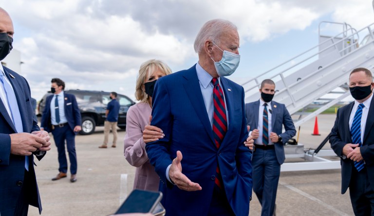 Jill Biden physically pulls Joe away from reporters in social-distancing reminder
