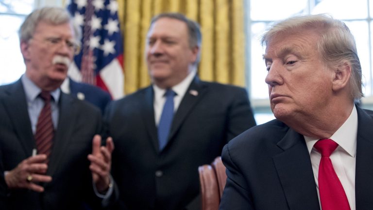 From left, National Security Adviser John Bolton, accompanied by Secretary of State Mike Pompeo, and President Donald Trump, speaks before Trump signs a National Security Presidential Memorandum to launch the "Women's Global Development and Prosperity" Initiative in the Oval Office of the White House in Washington, Thursday, Feb. 7, 2019. 