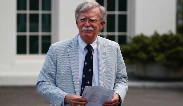 Former national security adviser John Bolton walks to speak to media at the White House in Washington, Wednesday, July 31, 2019. 