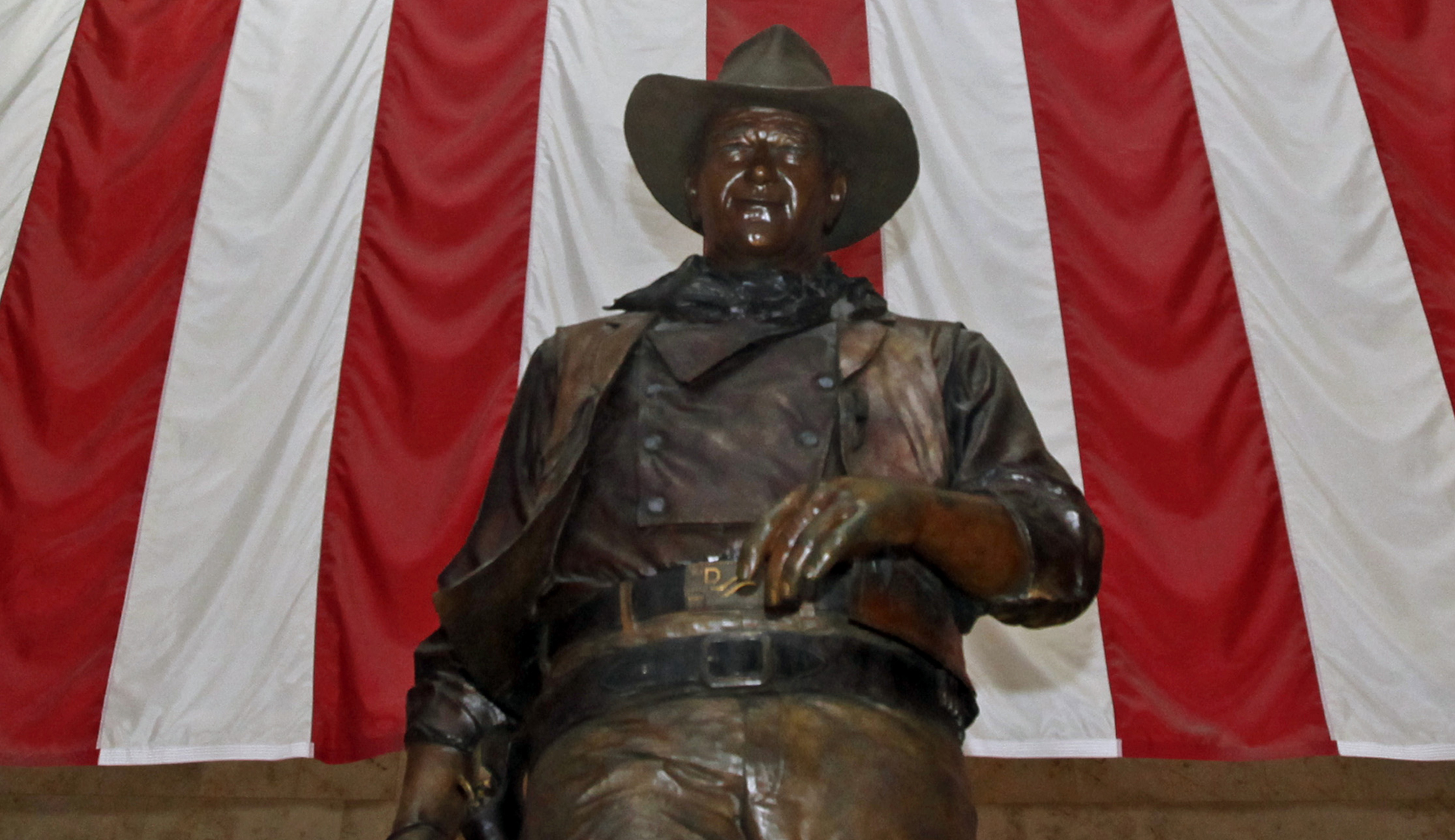 Columnist says ‘racist and homophobe’ John Wayne name should be stripped from airport