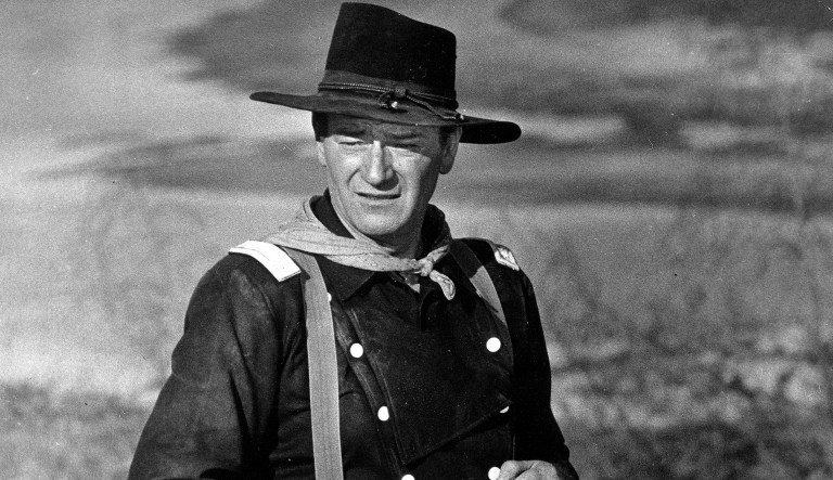 John Wayne is shown during the filming of  "The Horse Soldiers."
