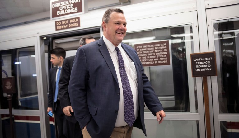 FILE - In this Jan. 25, 2018 file photo, Sen. Jon Tester, D-Mont., arrives for voting at the Capitol in Washington. Tester is trying to appeal to Montana voters who elected President Donald Trump in a new campaign ad.