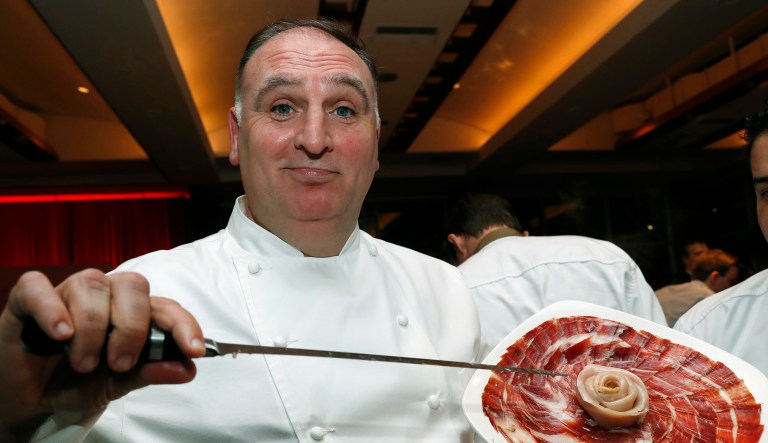 Spanish chef Jose Andres displays 48-month cured ham from acorn-fed, free-range, black-footed Iberico pigs from Spain at his ThinkFoodGroup station, Tuesday, Feb. 27, 2018, during the Careers through Culinary Arts Program (C-CAP) annual benefit in New York. Andres was honored with the C-CAP Honors award, which is granted to individuals within the culinary industry for exceptional leadership and achievements.