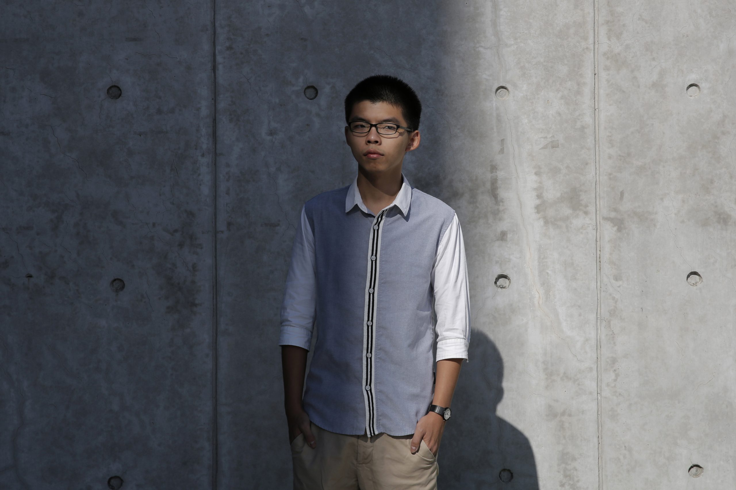 Face of Hong Kong protests steps down and pro-democracy group disbands after China passes security law