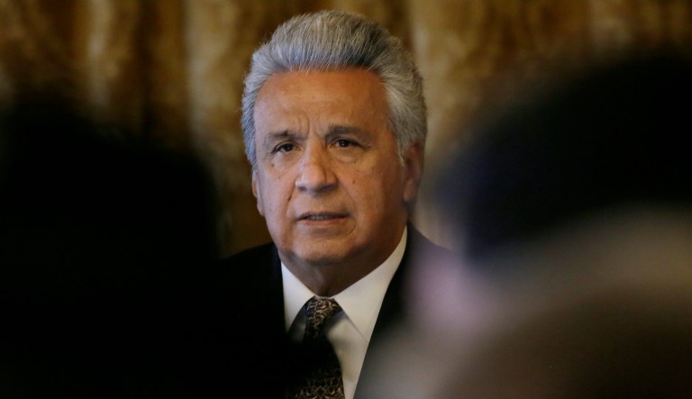 Ecuador's President Lenin Moreno talks to the press before meeting with delegates of social groups at the presidential palace in Quito, Ecuador, Tuesday, March 10, 2020. Moreno is preparing to announce economic measures to help prepare for the fall in the price of oil, his nation's main export, triggered by the new coronavirus, which the vast majority of people recover from. 