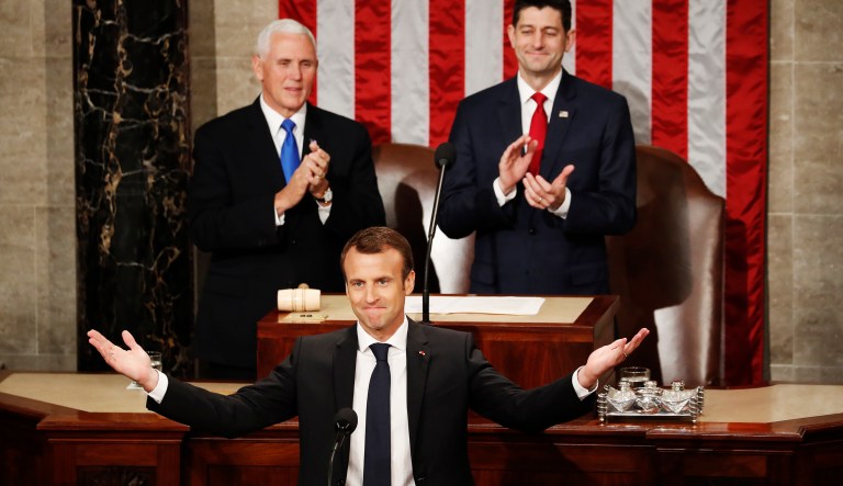 French President Emmanuel Macron gestures as he arrives for his address to a joint meeting of Congress on Capitol Hill in Washington, Wednesday, April 25, 2018.