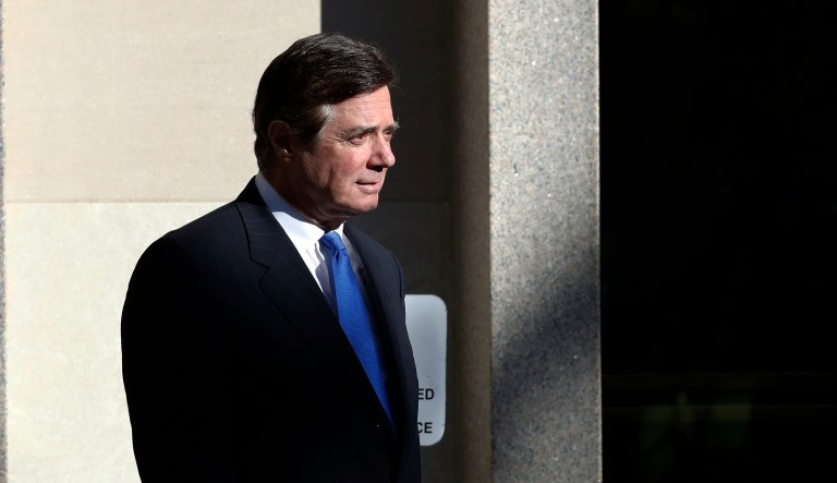 FILE - In this Monday, Oct. 30, 2017, file photo, Paul Manafort walks from Federal District Court in Washington. The three nations named in the indictment of former Trump Campaign Chairman Paul Manafort have been known by financial crime experts in the past as locations for money laundering or at risk of being used for money laundering.