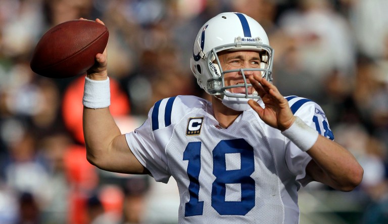 Indianapolis Colts quarterback Peyton Manning (18) passes against the Oakland Raiders in the third quarter of an NFL football game in Oakland, Calif., Sunday, Dec. 26, 2010.