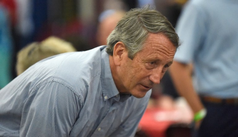 Former U.S. Rep. Mark Sanford speaks with attendees at U.S. Rep. Jeff Duncan's annual fundraiser on Monday, Aug. 26, 2019, in Anderson, S.C. Sanford is mulling a 2020 GOP challenge to President Donald Trump.