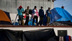 Migrants moved farther from US-Mexico border after Tijuana shelter gets shut down