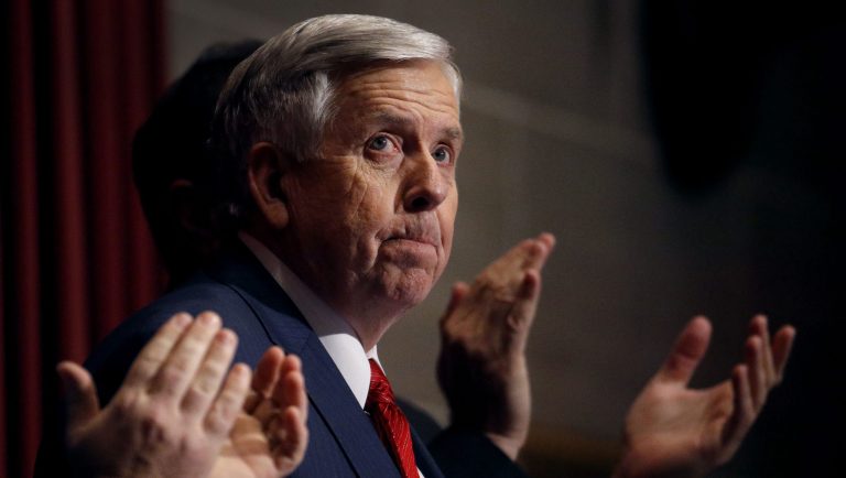Missouri Gov. Mike Parson pauses for applause as he delivers his State of the State address Wednesday, Jan. 16, 2019, in Jefferson City, Mo. 