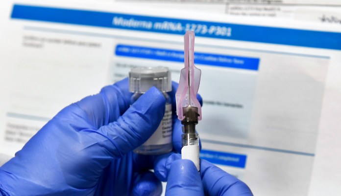 Moderna says vaccine highly effective after six months in application for full approval