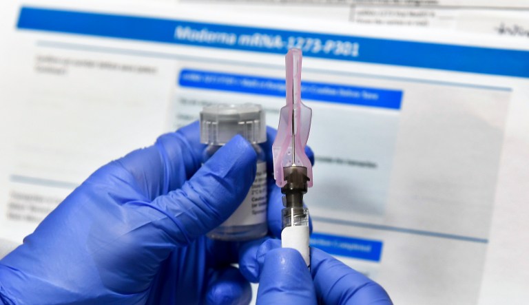 Dow closes at record high on Moderna coronavirus vaccine news
