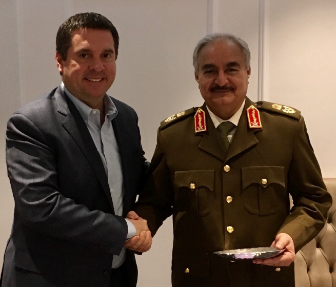 Rep. Devin Nunes (left) shakes hands with Gen. Khalifa Haftar (right).