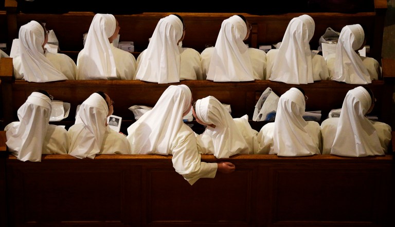Nuns sit in their pews while waiting for Pope Francis to arrive inside the Basilica of the National Shrine of the Immaculate Conception Wednesday, Sept. 23, 2015, in Washington.