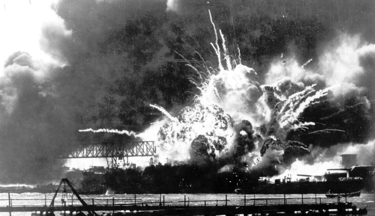 In this Dec. 7, 1941, file photo provided by the U.S. Navy, the destroyer USS Shaw explodes after being hit by bombs during the Japanese attack on Pearl Harbor, Hawaii. 