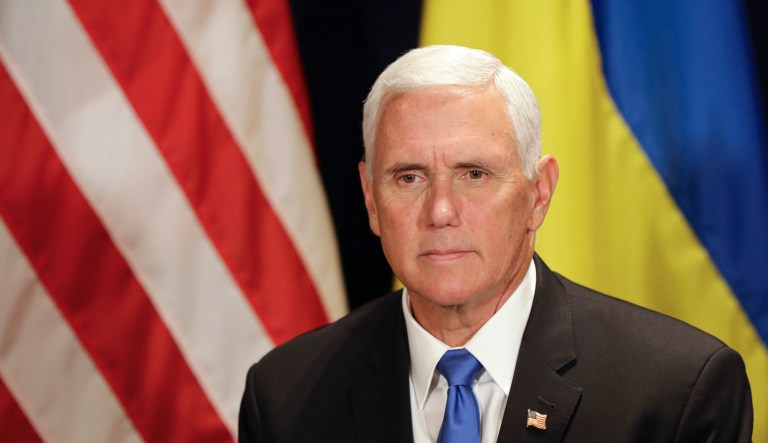 U.S. Vice President Mike Pence waits before a meeting with Ukraine's President Volodymyr Zelenskiy, in Warsaw, Poland, Sunday, Sept. 1, 2019.