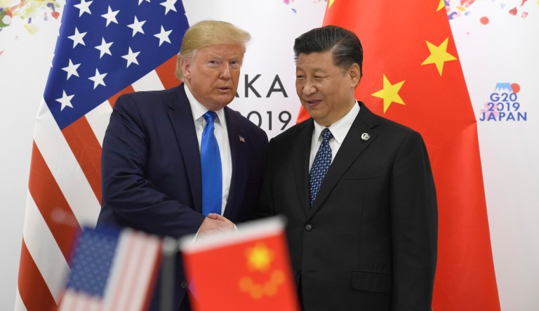 President Donald Trump poses for a photo with Chinese President Xi Jinping during a meeting on the sidelines of the G-20 summit in Osaka, Japan, Saturday, June 29, 2019.