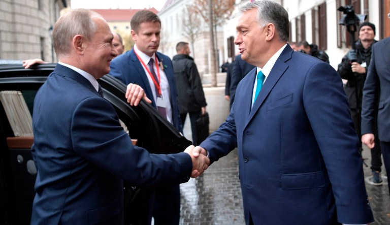 Hungarian Prime Minister Viktor Orban, right, greets Russian President Vladimir Putin upon his arrival in Budapest, Hungary, Wednesday, Oct. 30, 2019. (Alexei Nikolsky, Sputnik, Kremlin Pool Photo via AP)