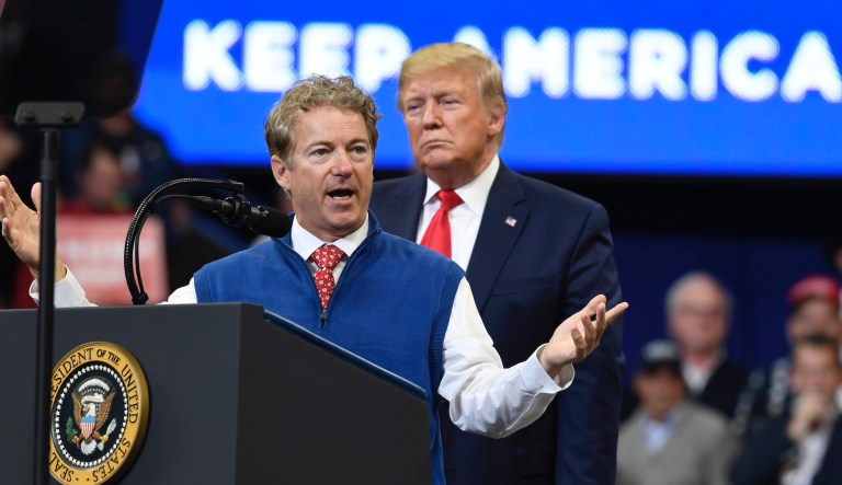 President Donald Trump stands with Sen. Rand Paul, R-Ky., during an event to sign an executive order on health care in the Roosevelt Room of the White House, Thursday, Oct. 12, 2017, in Washington.