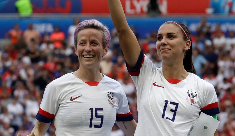 United States' Megan Rapinoe, left, and her teammate Alex Morgan, right, after winning the Women's World Cup final soccer match between US and The Netherlands at the Stade de Lyon in Decines, outside Lyon, France, Sunday, July 7, 2019.
