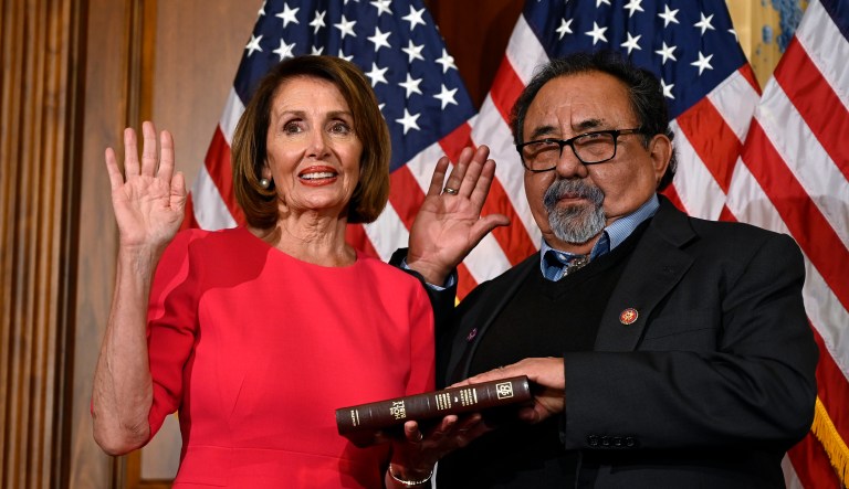 House Speaker Nancy Pelosi of Calif., left, poses during a ceremonial swearing-in with Rep. Raul Grijalva, D-Ariz., right, on Capitol Hill in Washington, Thursday, Jan. 3, 2019, during the opening session of the 116th Congress.