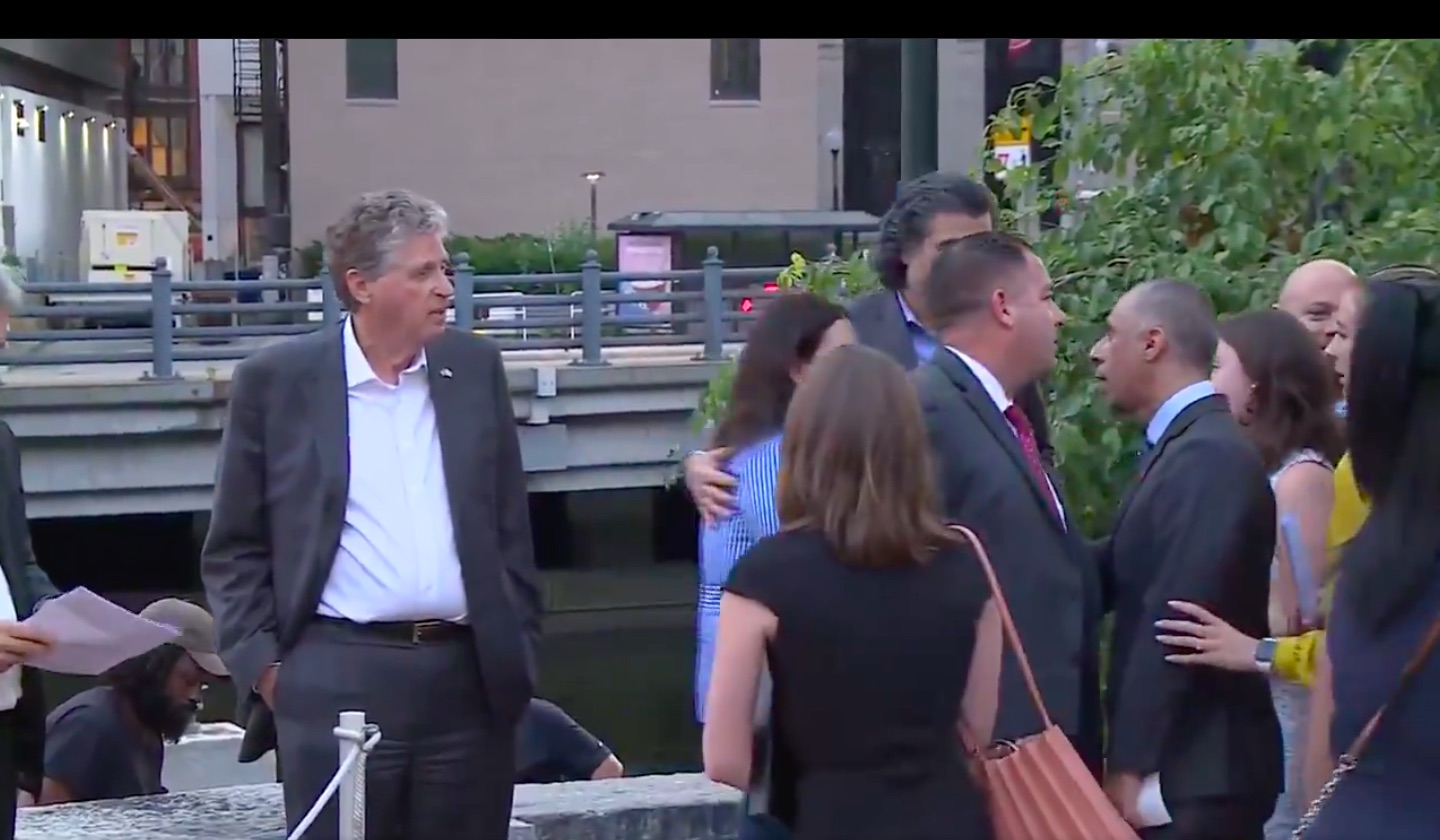Rhode Island governor and mayor separated by security during heated exchange