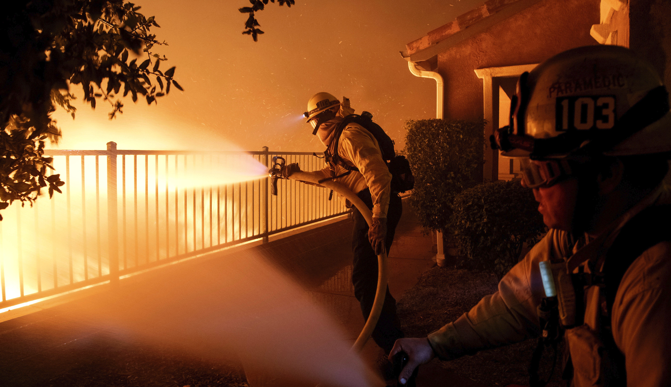 Los Angeles wildfire burns dozens of homes as thousands ordered to evacuate