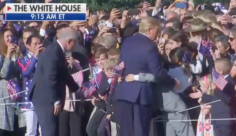 President Trump (center) and Australian Prime Minister Scott Morrison (left) greet children near the White House in Washington.